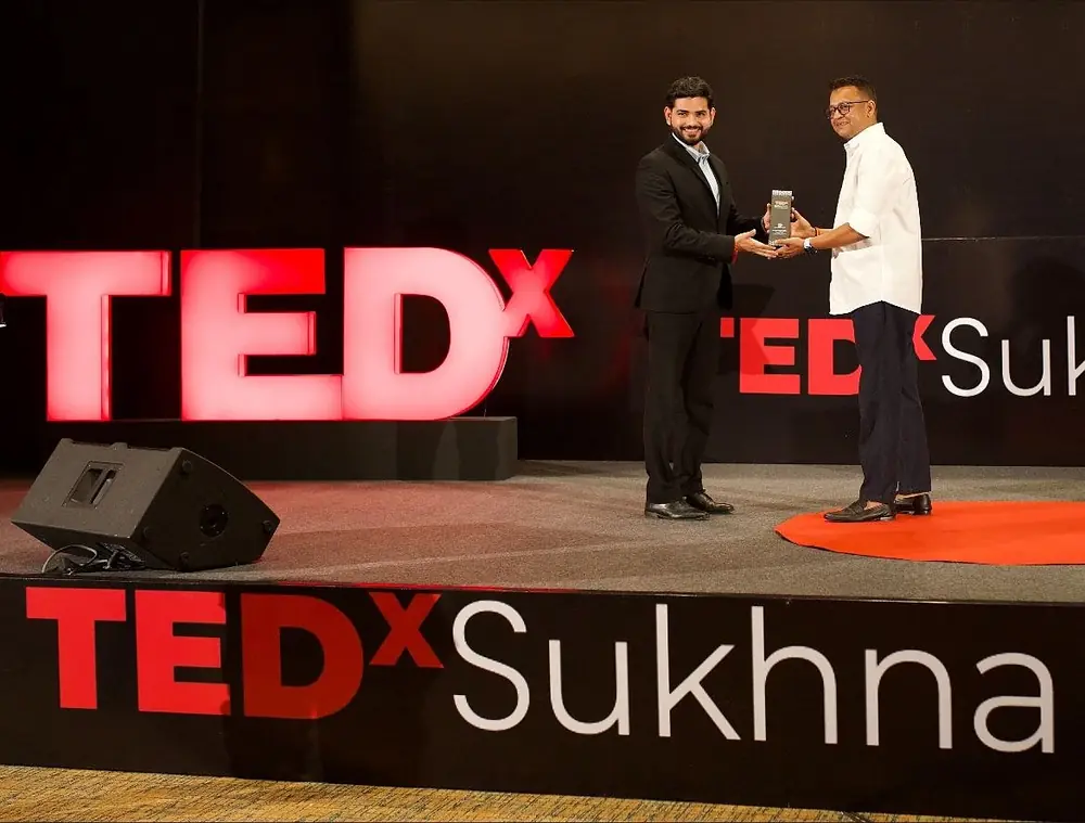 Chandan on stage at TEDxSukhna